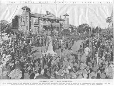 Memorial reveal 1914, The building behind is 2-4 Woolwich Road