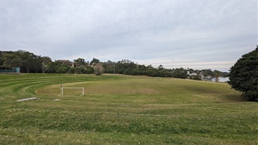 Bedlam Bay during the daytime, showing large open oval and an overcast sky