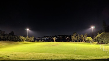 Bedlam Bay oval at nighttime, showing the floodlights in full operation.