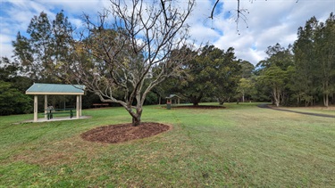 Buffalo Creek reserve public picnic area, featuring sheltered tabled seating, as well as public waste bins